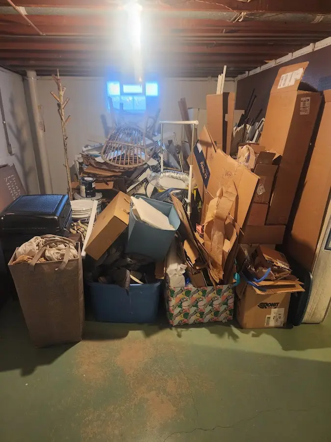 Roll-off dumpster container at job site for 4 Yard Dumpster Rental in Poplar Bluff